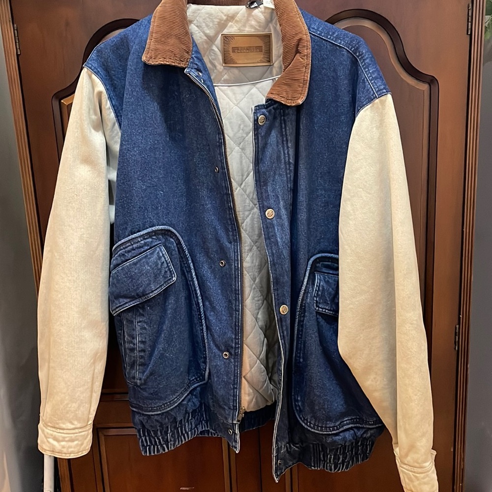 Unique blue jean jacket with quilted lining. Zip/snap enclosure 1XT $85